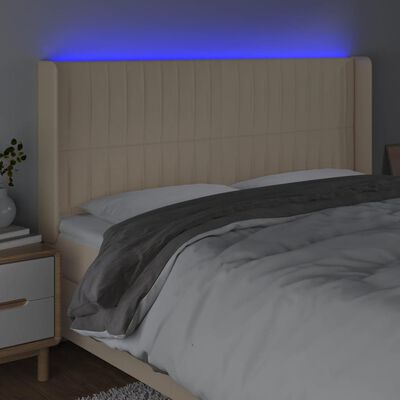 vidaXL Sänggavel LED gräddvit 183x16x118/128 cm tyg
