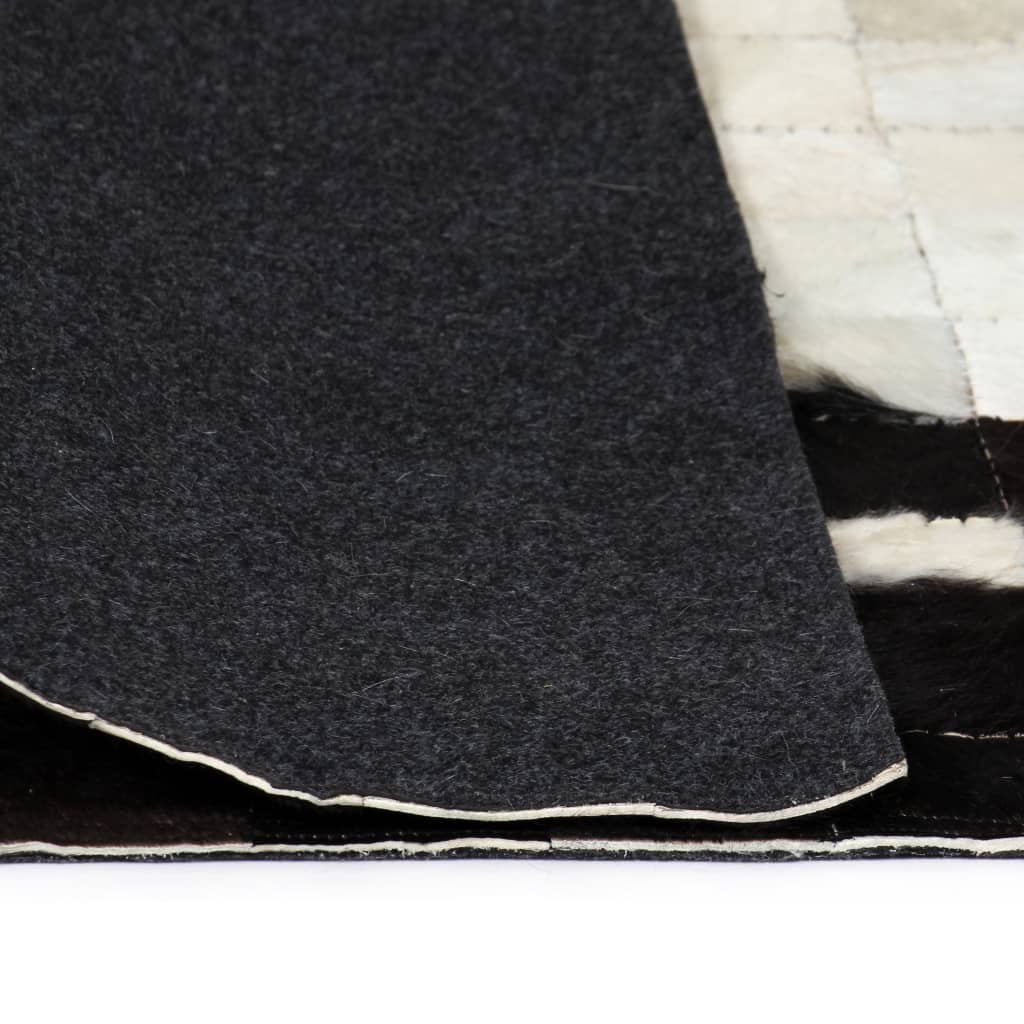 vidaXL Matta äkta läder lappad fyrkanter 80x150 cm svart/vit