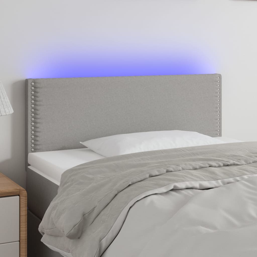 vidaXL Sänggavel LED ljusgrå 100x5x78/88 cm tyg