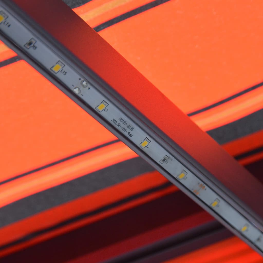 vidaXL Markis manuellt infällbar med LED 450x300 cm orange och brun