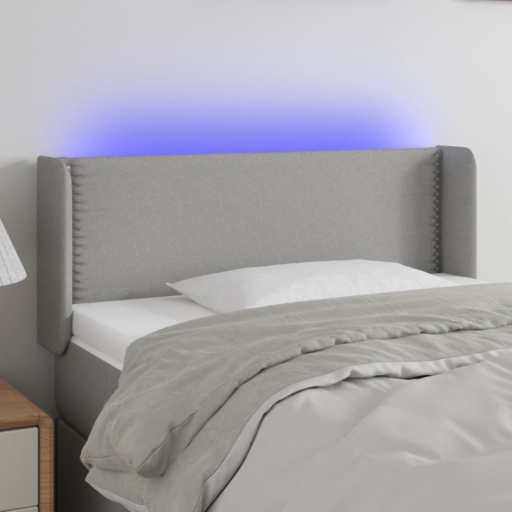 vidaXL Sänggavel LED ljusgrå 83x16x78/88 cm tyg